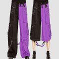 Black purple cyber goth pants with utility pockets, metal rings, and wide-leg alternative streetwear design