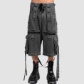 Wide leg cargo jeans in black wash denim with utility pockets, adjustable straps, and relaxed streetwear styling