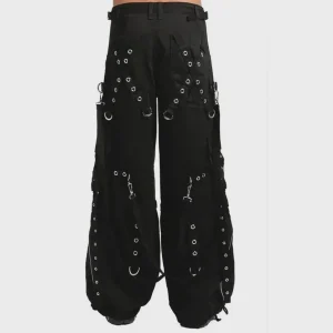 Black cyber goth cargo pants with straps, D-ring hardware and wide-leg alternative fashion design rear view