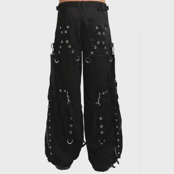Black cyber goth cargo pants with straps, D-ring hardware and wide-leg alternative fashion design rear view