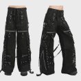 Black cyber goth cargo pants with straps, D-ring hardware and wide-leg alternative fashion design