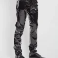 Black shiny PVC gothic pants featuring slim leg silhouette side view